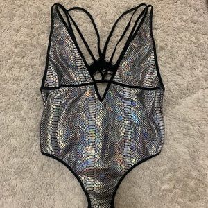 Iridescent body suit
